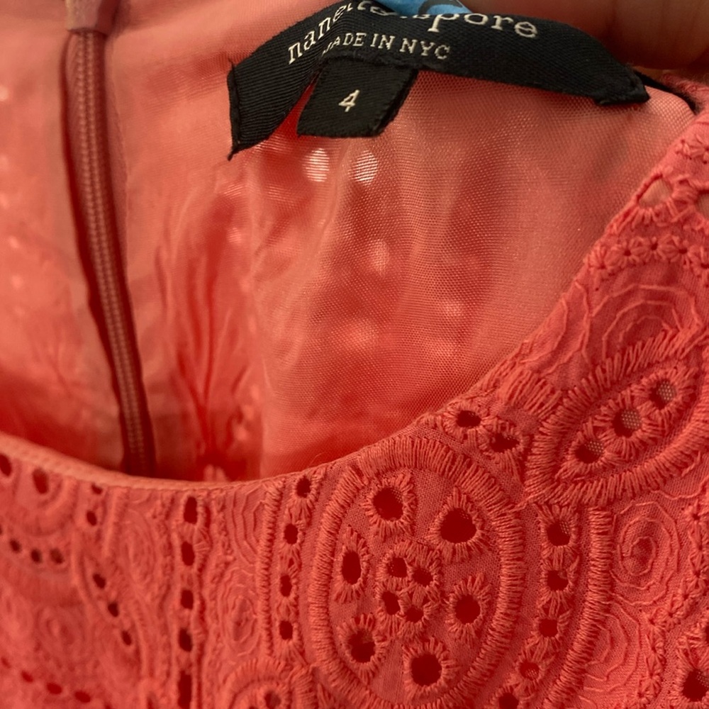 Nanette Lepore size 4 100% cotton eyelet dress with flattering side cutouts.